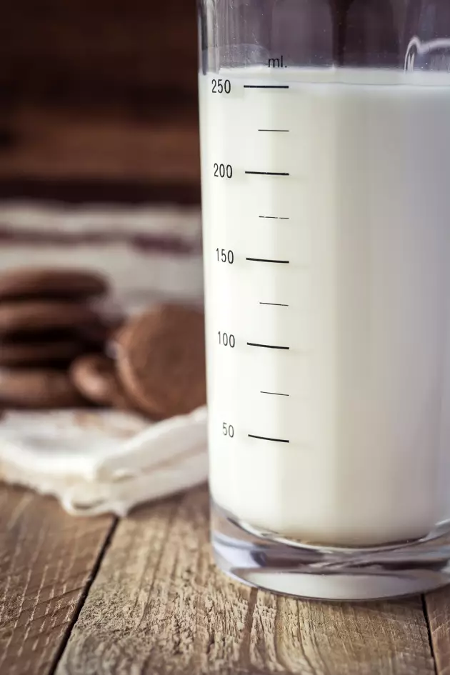 measuring cup of milk